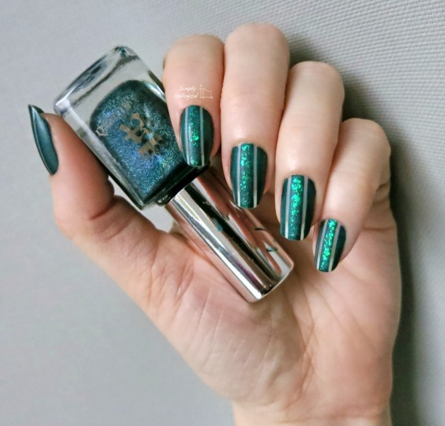 emerald green nails with gems