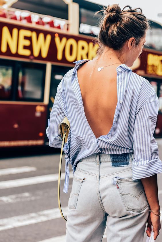 How To Pull Off The Backward Shirt Trend